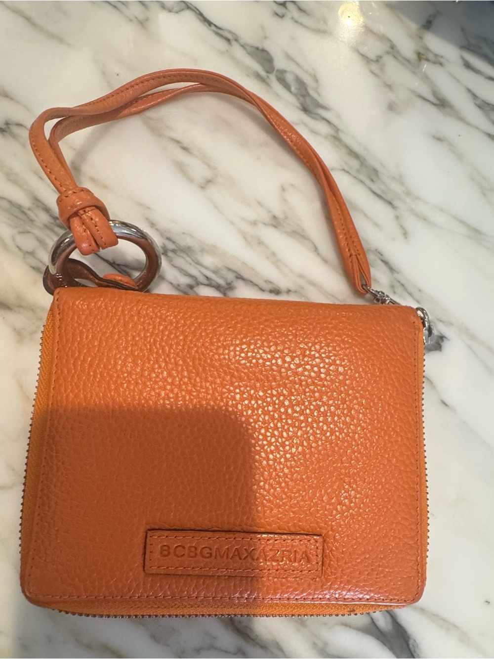 BCBGMaxAzria Orange Pebbled Leather Wristlet Clutch